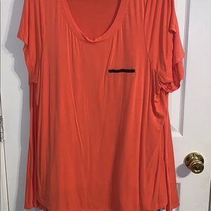 Peach colored shirt